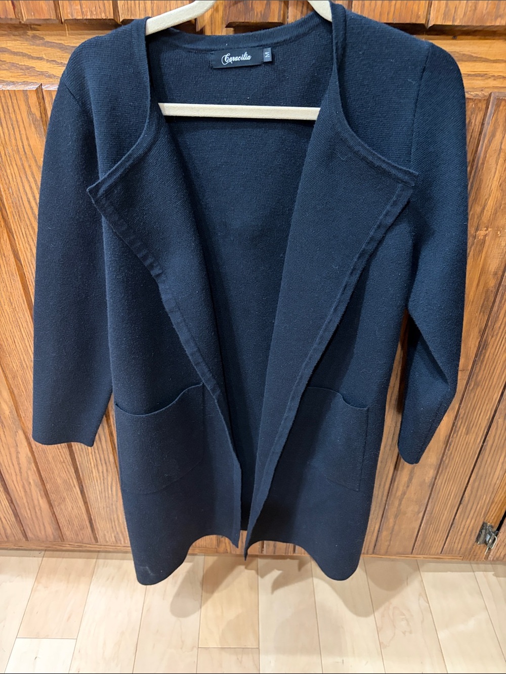 Caracilia  sweater coat Size M
Black in color like new